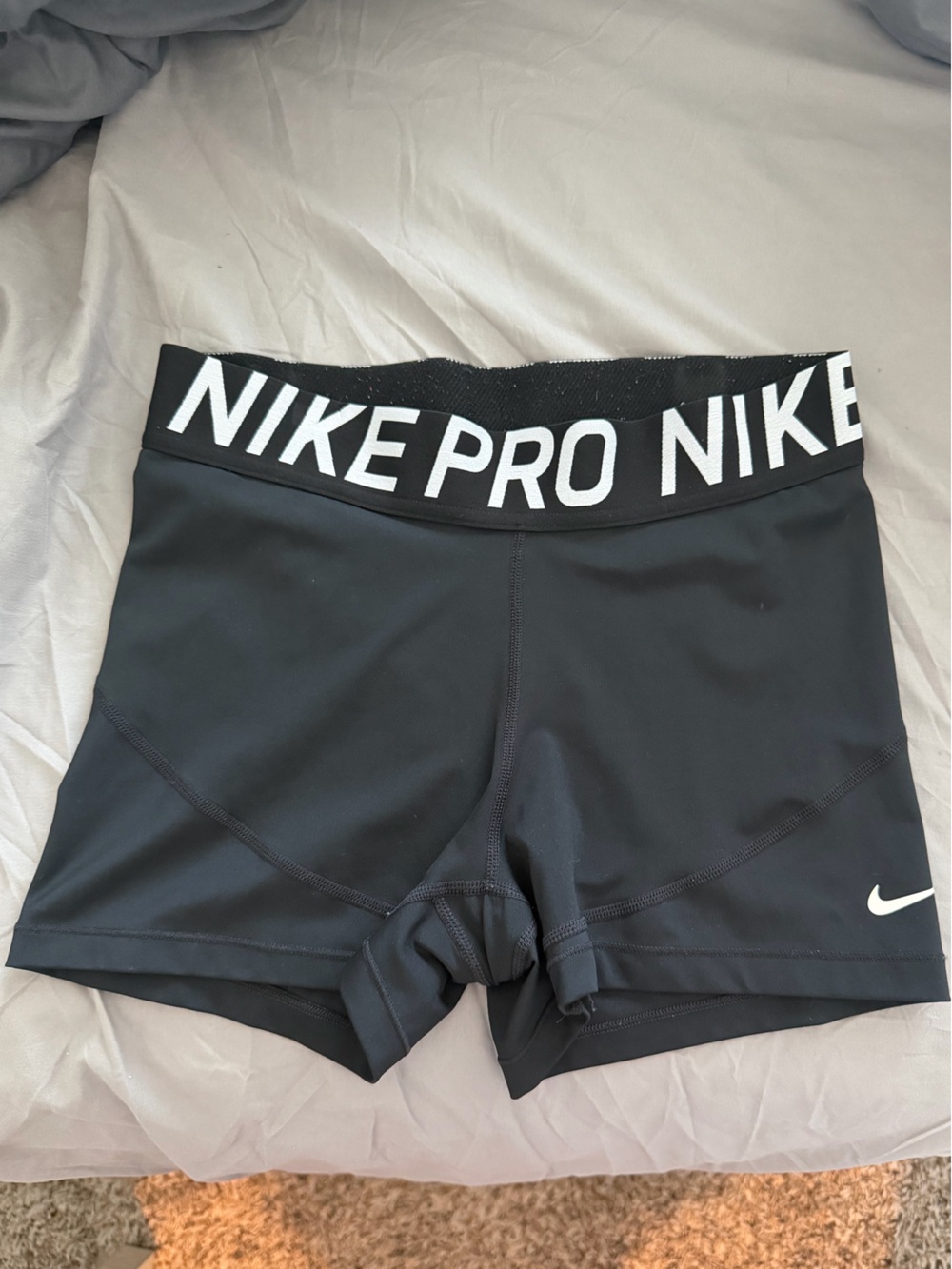 Nike Pro dri-fit black shorts with white text ‘NIKE PRO NIKE' size large